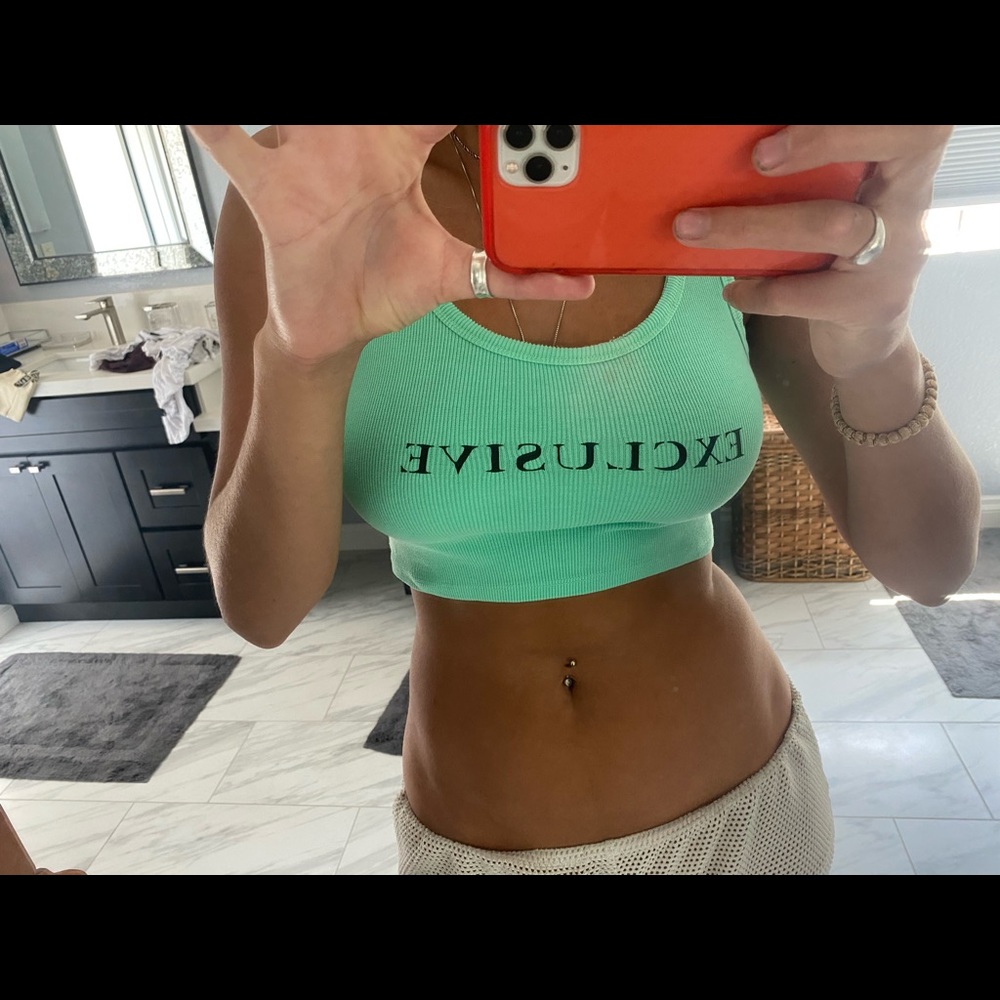 Green “exclusive” crop tank